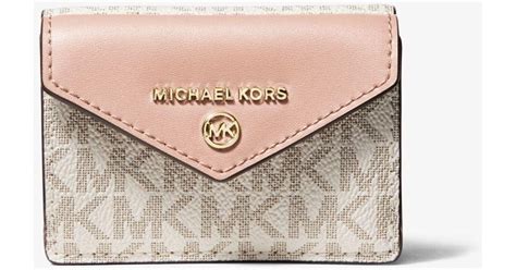 pink michael kors logo wallet|Michael Kors soft pink wallet.